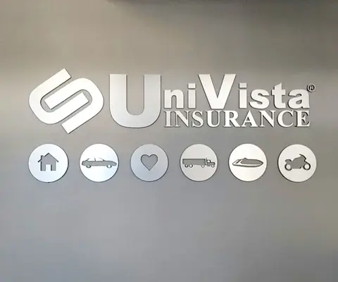 Univista Insurance wall sign with service icons