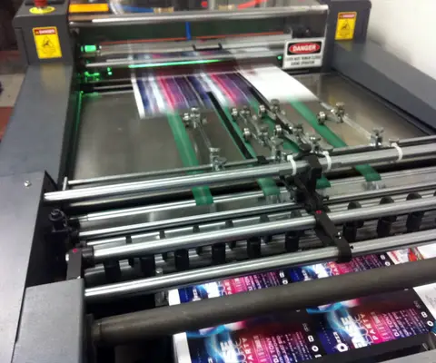 Printing press running a job